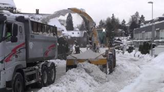 Volvo L70E with snowblower loading truck  Oslo Norway [upl. by Ahseia]