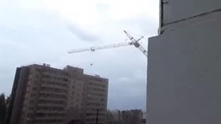 Crane collapses into apartment building in Kirov Russia [upl. by Diskin]