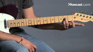 How to Play a C7 Barre Chord  Guitar Lessons [upl. by Kamp564]