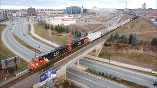 Awesome Aerial 4K View Two Tier 4 Gevos Lead a Long Freight Train CN 507 Passing thru Moncton NB [upl. by Ainecey]