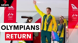 Australian athletes return home from Paris  7NEWS [upl. by Suehtomit328]