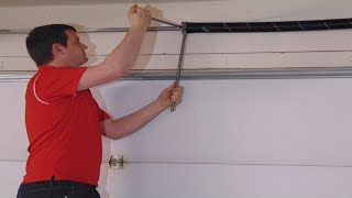 Garage Door Torsion Spring Replacement How to by Professional Tech [upl. by Eltsirc]