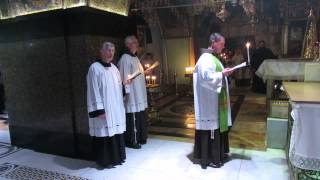 Franciscan monks in prayer at Calvary Golgotha​​ the Church of the Holy Sepulchre Jerusalem [upl. by Elia]