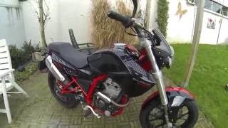 Derbi Mulhacen 125 Cafe review comparison KTM Duke 125cc [upl. by Nairadal]