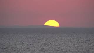 Sunset behind the island of Vis filmed from Lastovo [upl. by Ricki724]