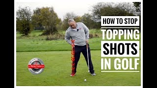 How To Stop Topping Shots In Golf [upl. by Atirac511]