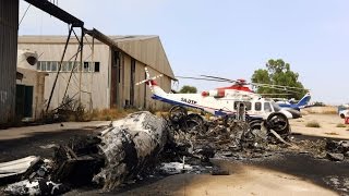 DébatF24  Violences en Libye  laéroport de Tripoli en partie détruit par des roquettes [upl. by Eniamrahs]