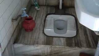 Traditional Toilet hole in the floor in New Delhi India [upl. by Amehsyt]