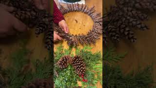 Making a pine cone wreath Merry Christmas gardens diy [upl. by Cristiano925]