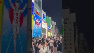 The iconic Dotonbori bridge and neon signs in Osaka Japan at night June 2024 [upl. by Ellsworth]