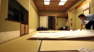 Making up a futon bed at Japanese traditional Ryokan [upl. by Nolyarg]