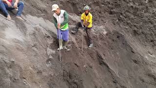 this guy helped the miners drop the sand and load it into the truck but he slipped [upl. by Dinerman]