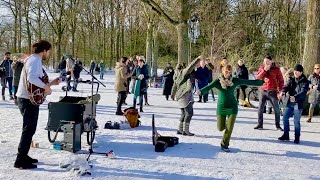 Street Performer makes People Dance in the Snow Funk Guitar [upl. by Arathorn]