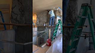 Rock wall installation Day 2 homerenovation rockwall [upl. by Asiuqram]