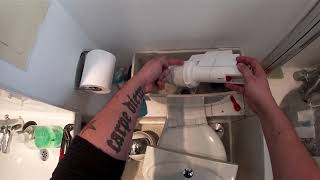 Plumbing how to replace the washer on a flush valve letting by into WC pan [upl. by Akemhs]