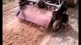 Tow behind tiller 4 feet wide 11 hp rotary plow homemade self powered [upl. by Pol]