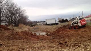 Bobcat s185 digging a retention pond [upl. by Aihsetal32]