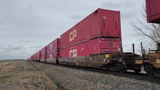 VERY FAST CPKC Train 118 Eastbound Brooks Subdivision mile 157 Indus Alberta April 26 2024 [upl. by Yrakaz440]