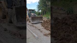 First push on dirt pile CAT Backhoe [upl. by Goeger408]