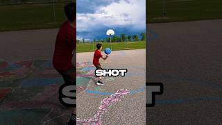 Half court shot While Spinning Basketball basketball shorts [upl. by Seuqram827]