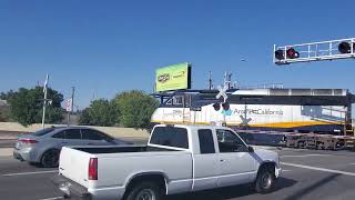 Amtrak California San Joaquin train 717 passing McKinley Ave Fresno ca [upl. by Schoenberg432]