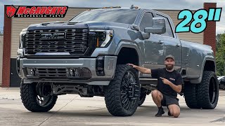 From Stock to Shock Upgrading the GMC Denali Ultimate Dually with 28” JTX and 9” McGaughys [upl. by Eerased]