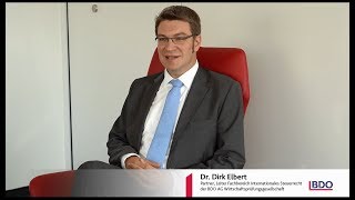 Dr Dirk Elbert Leiter Internationales Steuerrecht im Interview zur US Steuerreform [upl. by Jarib476]