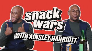 Ainsley Harriott Tries British And Jamaican Snacks  Snack Wars  LADbible TV [upl. by Mundy]