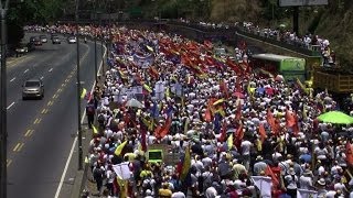 Thousands hit streets in new Venezuela protests tear gas fired [upl. by Ezeerb]