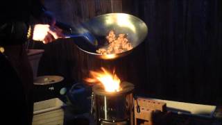 Silverfire Survivor Rocket Stove Cooking Peppered venison in the wok [upl. by Eixid]