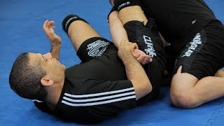 How to Do an Omoplata  MMA Submissions [upl. by Aicenat]