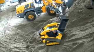 RC BRUDER TOY CAT BOBCAT SKID STEER CONSTRUCTION MODEL [upl. by Ettenej]