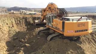 Liebherr R974B Excavator Loading Trucks [upl. by Aleacim]