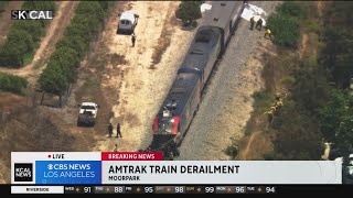 Amtrak train partly derails after colliding with truck [upl. by Saunder]