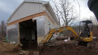 Installing a foundation under an existing building part 1 demo excavation footings [upl. by Nadroj]