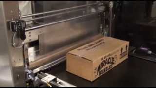 Inline Shrink Wrap Machine Wrapping Various Size Boxes [upl. by Qifahs841]