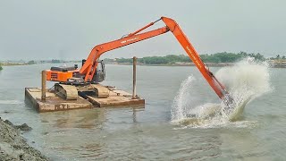 on pontoon Long Reach Excavator Digging The River TATA HITACHI EX215 Super long reach [upl. by Ormiston]