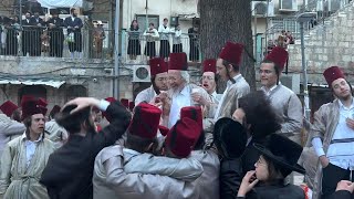 UltraOrthodox Jews celebrate Purim holiday in Jerusalem  AFP [upl. by Tildie515]