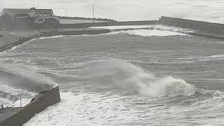 View from Bervie Braes shows boats sheltering from powerful waves behind Stonehaven Harbour wall [upl. by Jahdiel]