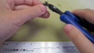 How to crimp with pliers or a crimping tool using bead and tube crimps [upl. by Ludwog]