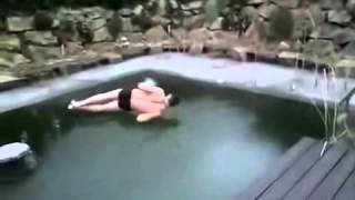 Cannonball Ice Dude jumps into frozen pool [upl. by Annagroeg]