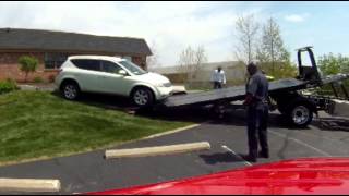 Towing Recovery  SUV High Centered on curb [upl. by Asa]