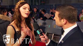 Anya TaylorJoy Loves The Shape of Water  Red Carpet Interview  EE BAFTA Film Awards 2018 [upl. by Ancalin]