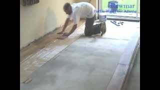 Installing Solid Oak Floor onto concrete with Rewmar MS Polymer Flexible Adhesive [upl. by Kasevich]