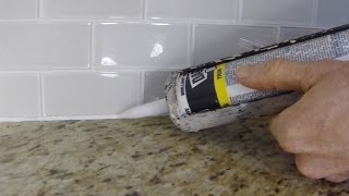 How To Install Caulk On A Kitchen Tile Backsplash [upl. by Aikal276]