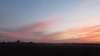 Rosy sunset with wavy altostratus clouds November 102021 [upl. by Yetnom504]