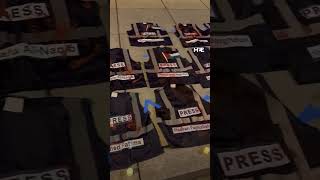 Protesters displayed bloody press vests at the White House correspondents dinner [upl. by Borreri]