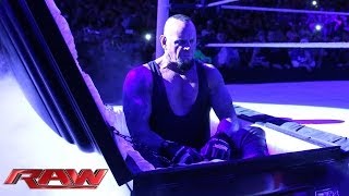 Undertaker rises from a coffin to attack Brock Lesnar Raw March 24 2014 [upl. by Eibrab]