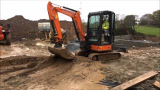 Mini Excavator working with very wet mud [upl. by Malory993]