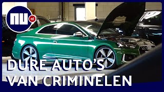 Kijk in de OM loods vol ingenomen sportauto’s van criminelen [upl. by Cooperstein941]